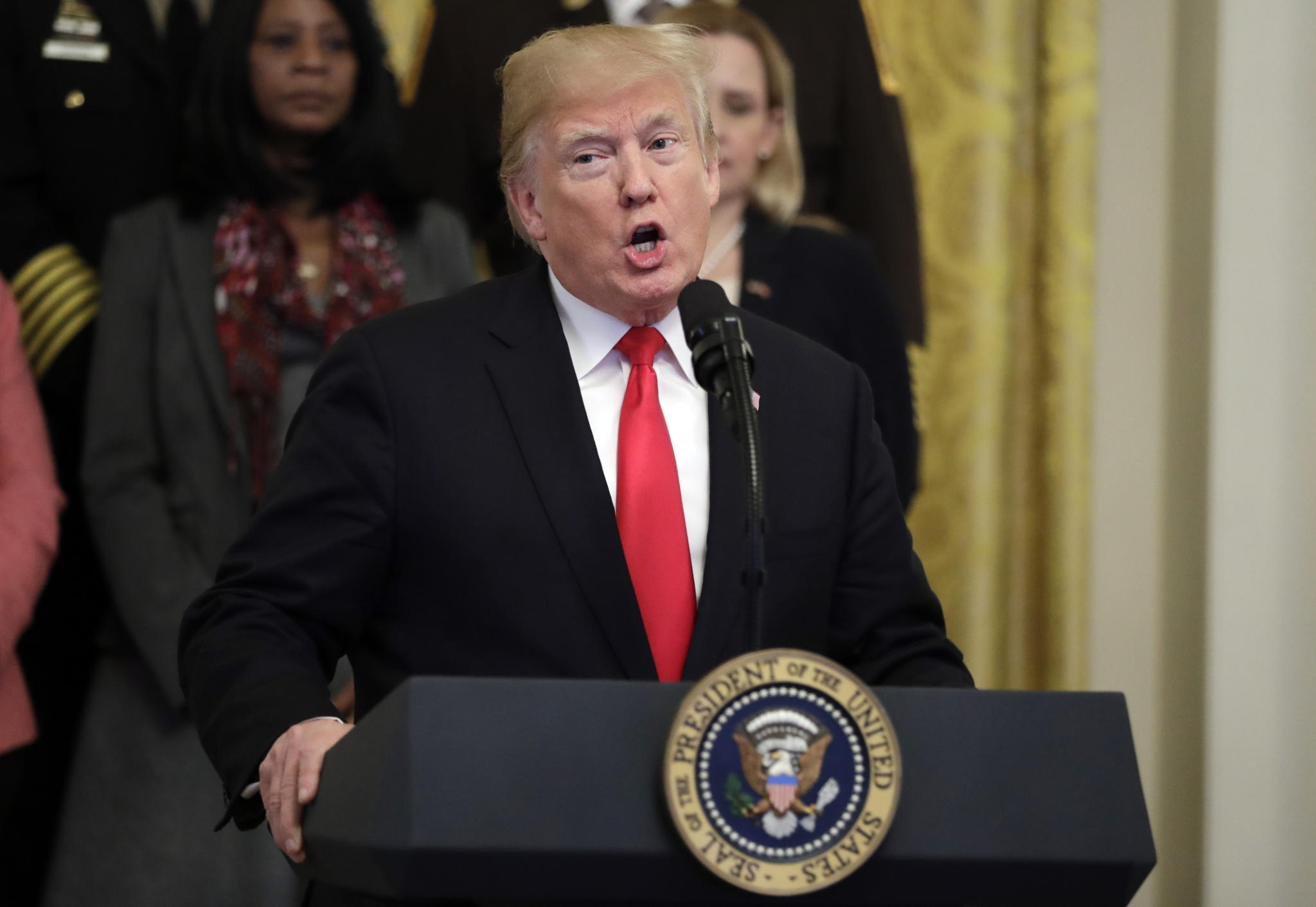 President Donald Trump speaks about crude pipe bombs targeting Hillary Clinton, former President Barack Obama, CNN and others, during an event on the opioid crisis, in the East Room of the White House, Wednesday, Oct. 24, 2018, in Washington. (AP Photo/Evan Vucci)